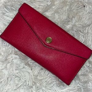 - Michael Kors Clutch Wallet